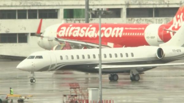 老虎配资 泰国前总理他信返回曼谷，将于9日听取法院裁决
